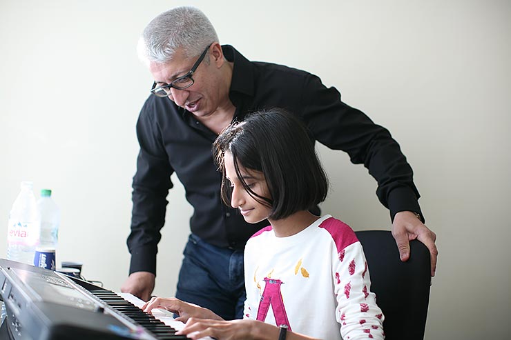 Russell helps young pianist release her ‘Inner Performer’- Holly’s Story